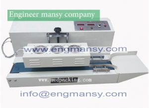 Continuous inductio n sealing machine